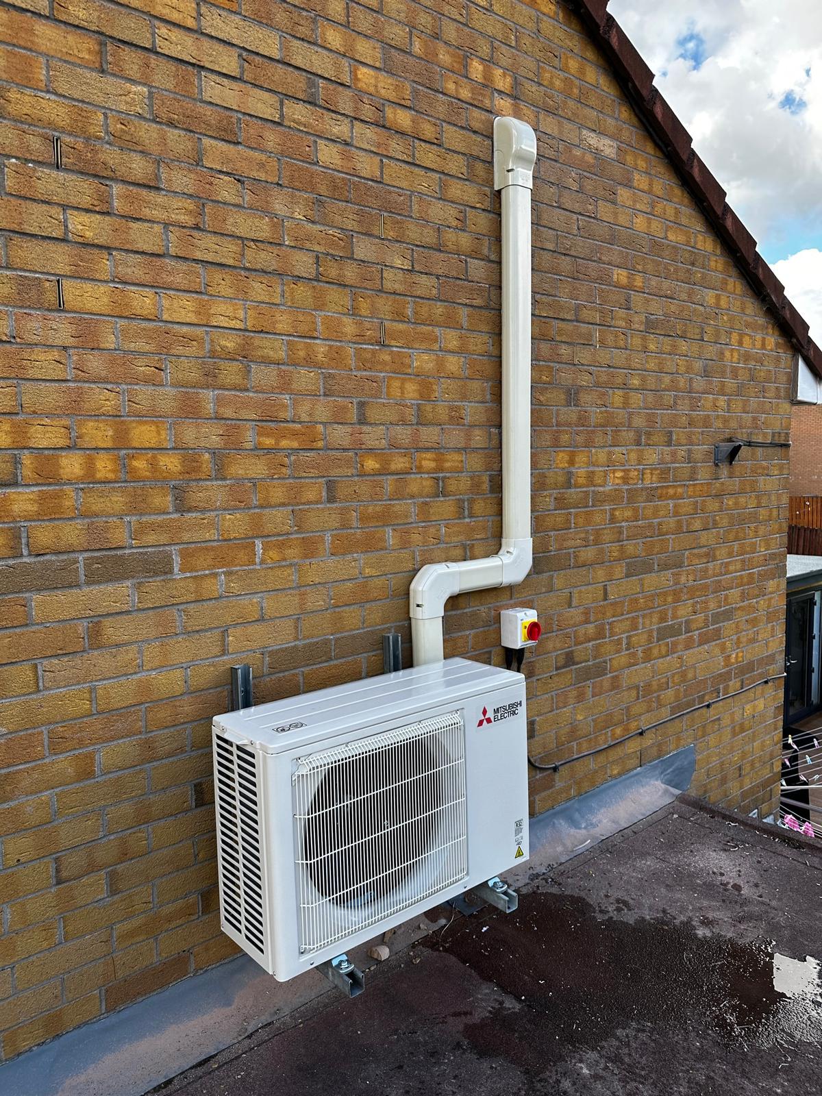 AC ventilation unit outside a house